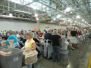 VOLUNTEERS PACKAGE 500,000 MEALS FOR HAITI